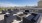 a group of couches on a rooftop overlooking a city